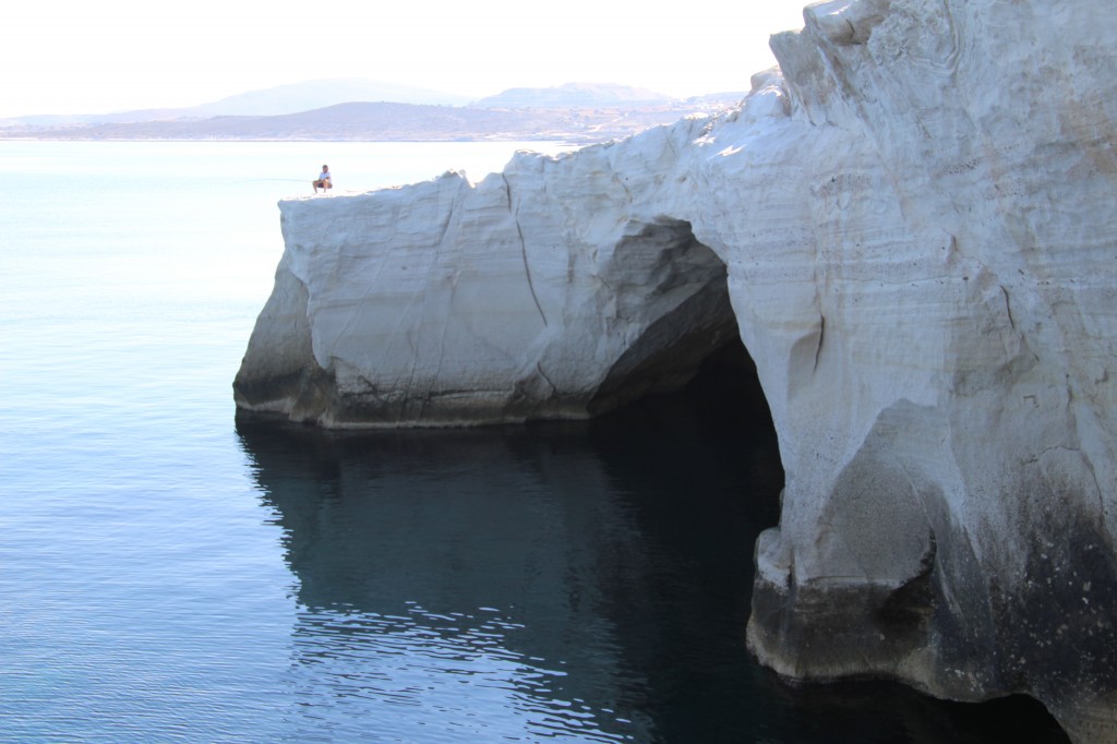 Hopeful fisherman on a gorgeous rock formation.